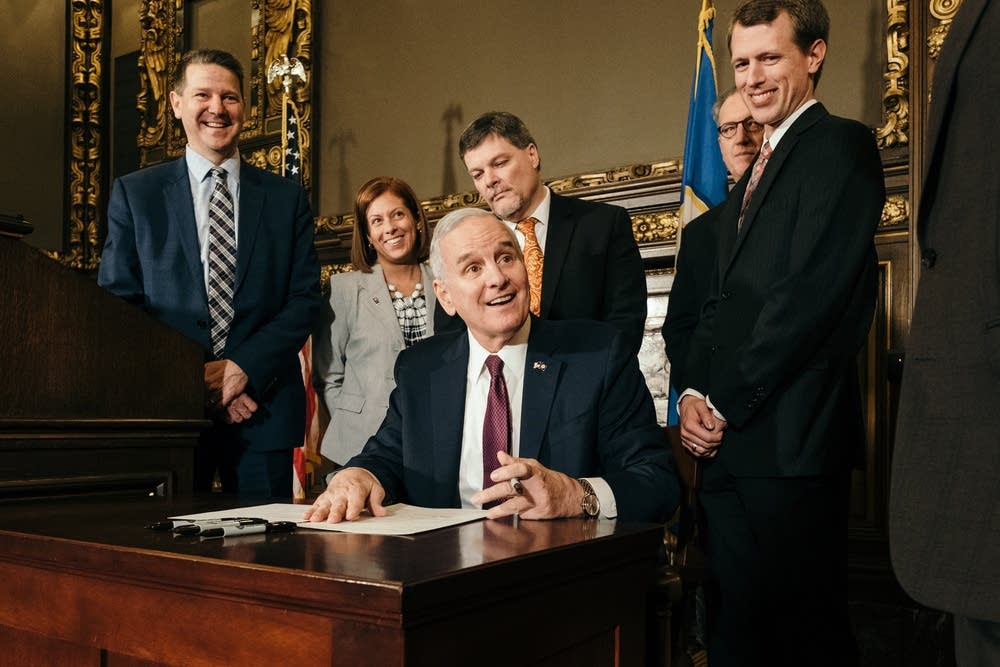 Governor Dayton signing a Bill